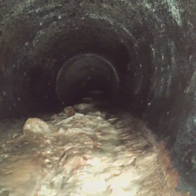 a water flowing through a tunnel
